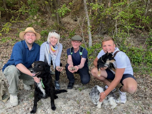 Travelers Carol and Bruce with truffle hunters and their dogs in Provence