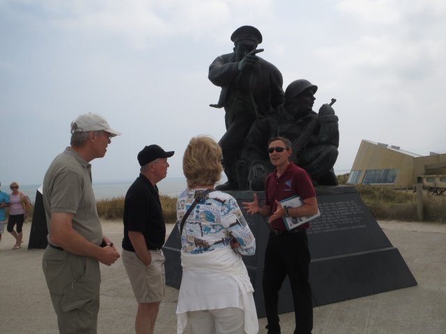 Travelers with one of our expert guides on the D-Day beaches