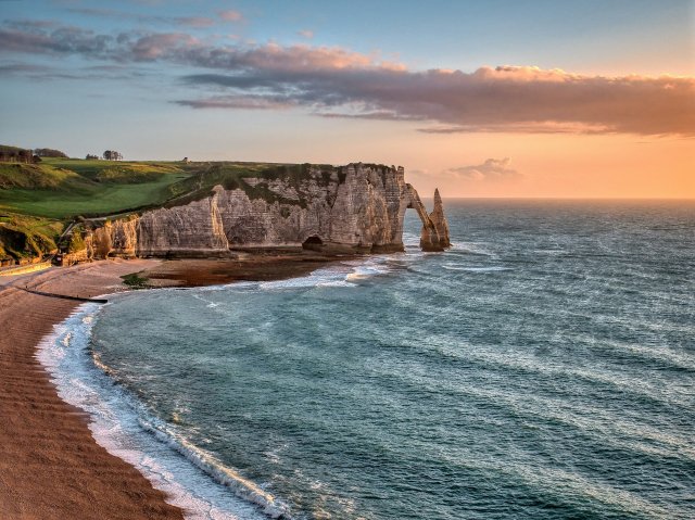 The cliffs of Etretat in Normandy at sunset