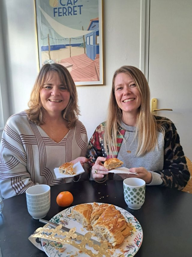 Trip planners Laura and Clelia eating Galette des Rois