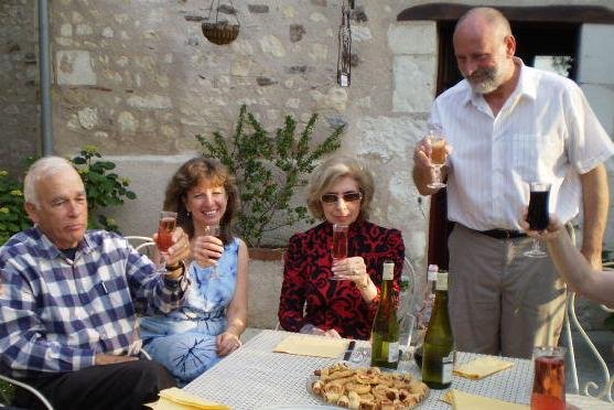 Guests around the table with their B&B host