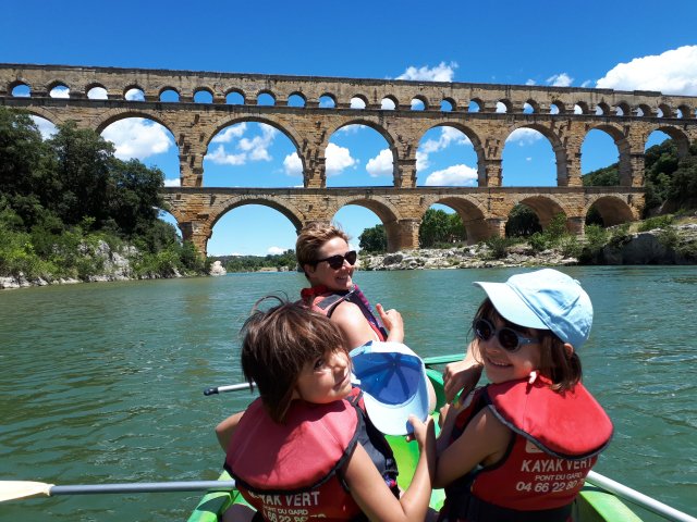 France Just For You Founder Emilie with her daughters at the Pont du Gard Roman Aqueduct