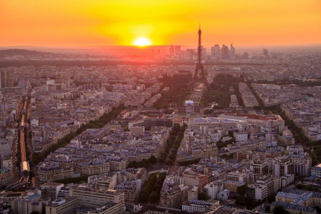 View of Paris at sunset from the top of the Montparnasse Tower