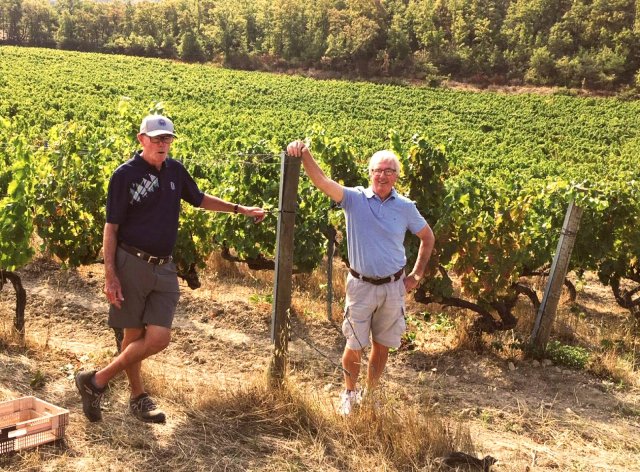 Travelers Ron and Don from Canada in a Burgundy vineyard