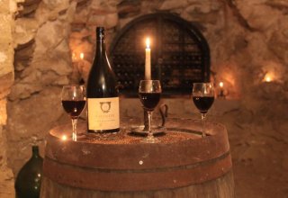 Enjoy having an aperitive drink the vaulted cellar before dinner