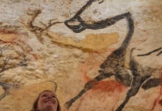 Trip planner Clelia in Lascaux IV replica cave